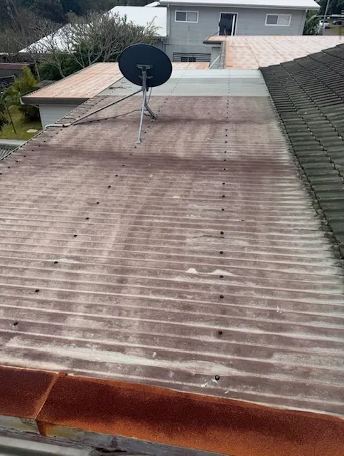 Weathered roof sheets before metal roof replacement on the Central Coast